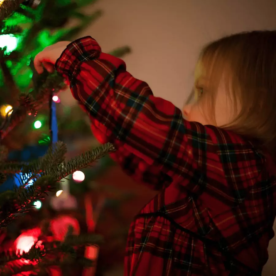 Child with Christmas tree